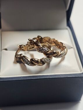 Sterling Silver Twisted Hoop Earrings with Gold Overlay Diamond Accent